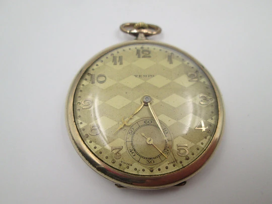 Reloj de bolsillo art decó Tempo. Laminado en oro 14k. Cuerda manual. Suiza. 1930