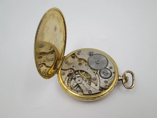 Reloj de bolsillo art decó Tempo. Laminado en oro 14k. Cuerda manual. Suiza. 1930