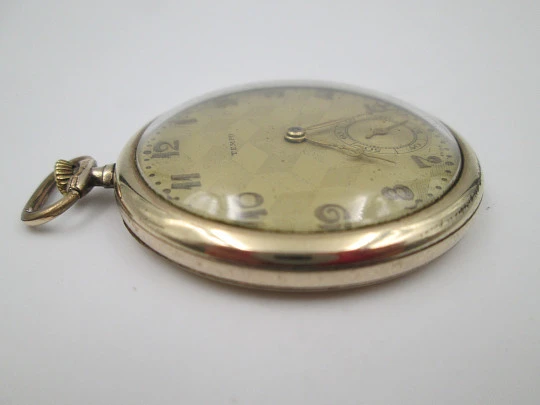 Reloj de bolsillo art decó Tempo. Laminado en oro 14k. Cuerda manual. Suiza. 1930