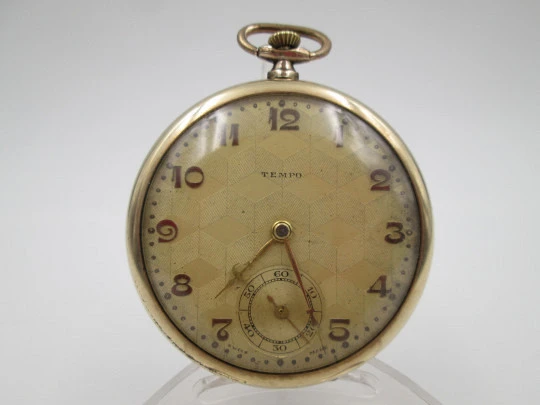 Reloj de bolsillo art decó Tempo. Laminado en oro 14k. Cuerda manual. Suiza. 1930