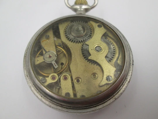 Reloj de bolsillo Lewa sistema Roskopf. Metal plateado. Remontoir con pulsador. 1900