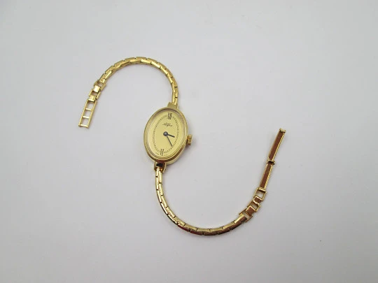 Reloj pulsera mujer Alfex. Chapado oro / acero. Brazalete. Cuerda manual. Funda. 1970