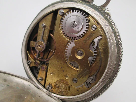 Reloj saboneta Regulador D.G. Plata de ley. Escudo de Castilla y León. Remontoir. 1910