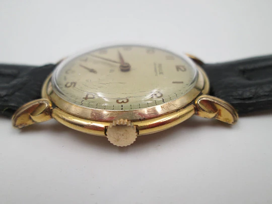 Revue art deco. 20 microns rolled gold. Manual winding. Small seconds hand. Swiss. 1930's