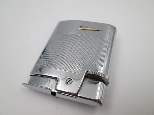 Ronson Varaflame pocket butane lighter. Chromed metal & golden arrowhead. England