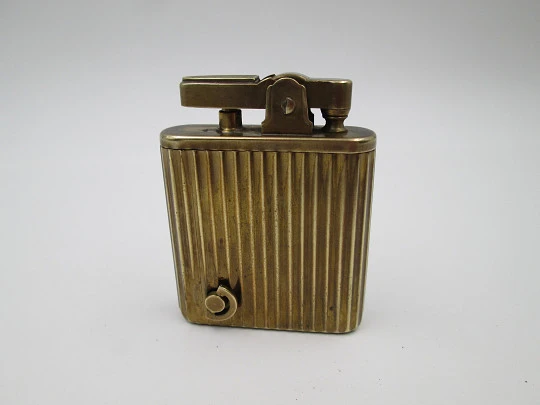 Royal Crown musical petrol pocket lighter. Gold plated metal. Ribbed pattern. Japan