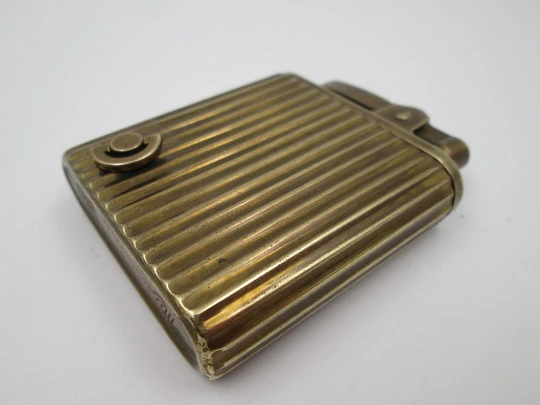 Royal Crown musical petrol pocket lighter. Gold plated metal. Ribbed pattern. Japan