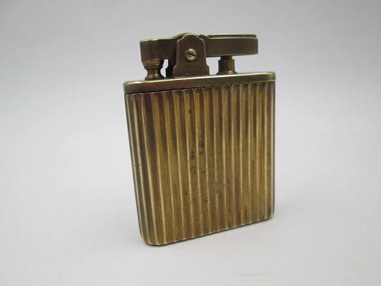 Royal Crown musical petrol pocket lighter. Gold plated metal. Ribbed pattern. Japan