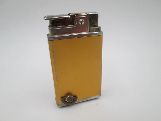 Royal musical butane pocket lighter. Bitone metal. Geometric motifs. Japan. 1960's