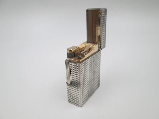 S. T. Dupont Paris lighter. Silver and gold plated. Diamond pattern. France. 1990's