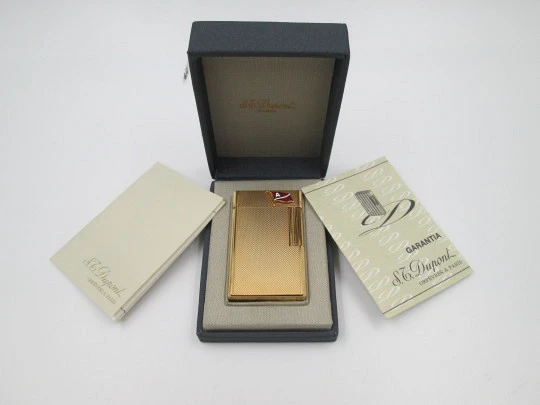 S.T. Dupont gas lighter. 20 microns gold plated. Box & warranty. France. 1990's