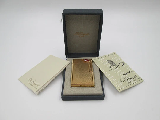 S.T. Dupont gas lighter. 20 microns gold plated. Box & warranty. France. 1990's