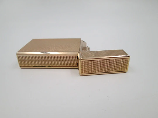 S.T. Dupont gas lighter. 20 microns gold plated. Cloth cover. France. 1990's