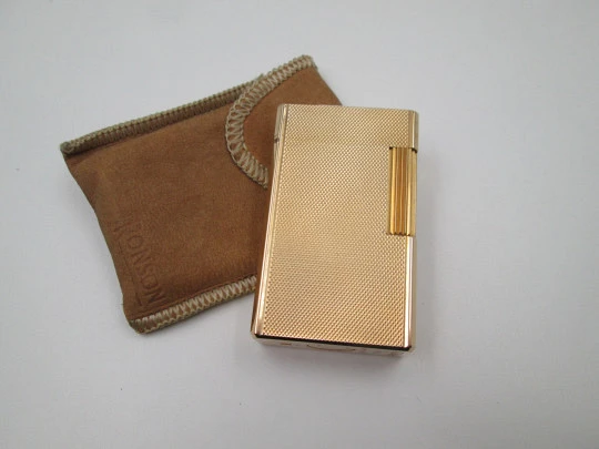 S.T. Dupont gas lighter. 20 microns gold plated. Cloth cover. France. 1990's