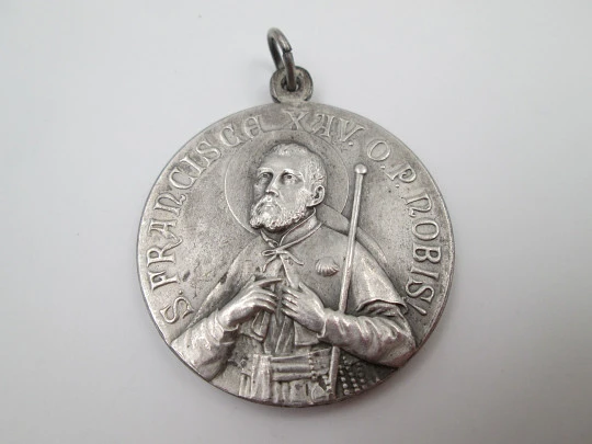 Saint Francis of Assisi and Immaculate Conception medal. Silver plated metal. 1950's