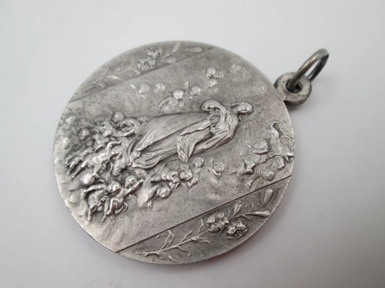 Saint Francis of Assisi and Immaculate Conception medal. Silver plated metal. 1950's