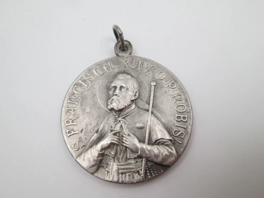 Saint Francis of Assisi and Immaculate Conception medal. Silver plated metal. 1950's