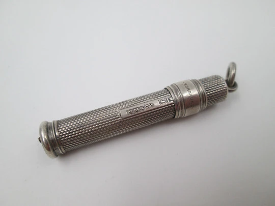 Sampson Mordan extendable pencil. Sterling silver. United Kingdom. Guilloche pattern