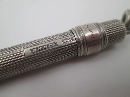 Sampson Mordan extendable pencil. Sterling silver. United Kingdom. Guilloche pattern