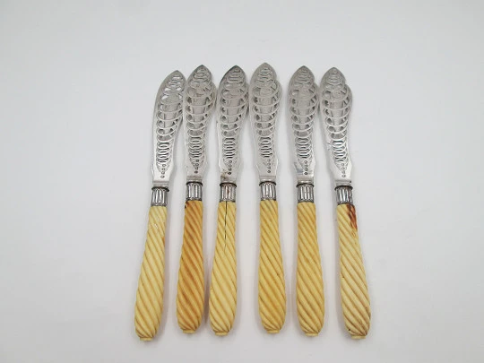 Set of six openwork fish knives. Cod swimming in water spiral. Silver plated. England. 1900's