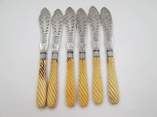 Set of six openwork fish knives. Cod swimming in water spiral. Silver plated. England. 1900's