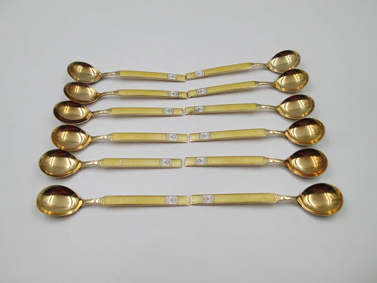 Set twelve spoons. 925 sterling silver and bitone enamel. Anchor motif. Europe. 1930's