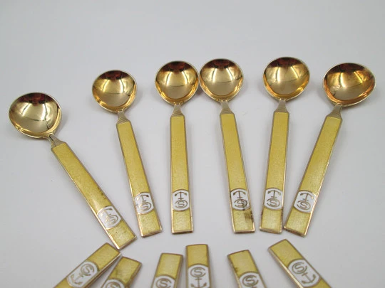 Set twelve spoons. 925 sterling silver and bitone enamel. Anchor motif. Europe. 1930's