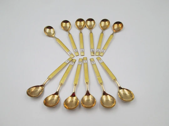 Set twelve spoons. 925 sterling silver and bitone enamel. Anchor motif. Europe. 1930's