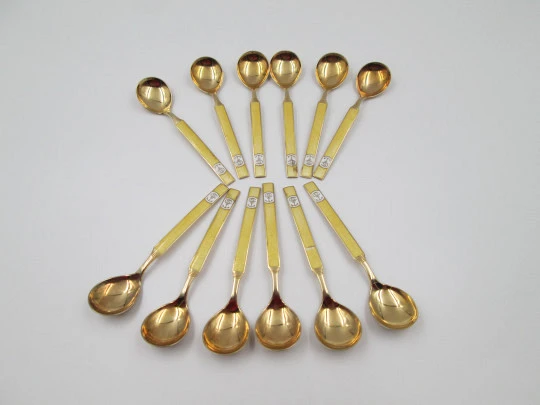 Set twelve spoons. 925 sterling silver and bitone enamel. Anchor motif. Europe. 1930's