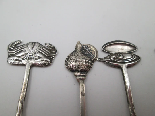 Seven cocktail picks collection. 925 sterling silver. Seafood motifs. Spain. 1980's