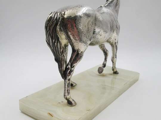 Silver plated horse sculpture with white marble base. Cunill Goldsmiths. Spain. 1990's