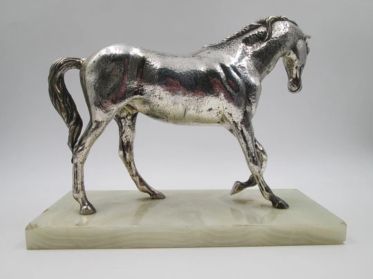 Silver plated horse sculpture with white marble base. Cunill Goldsmiths. Spain. 1990's