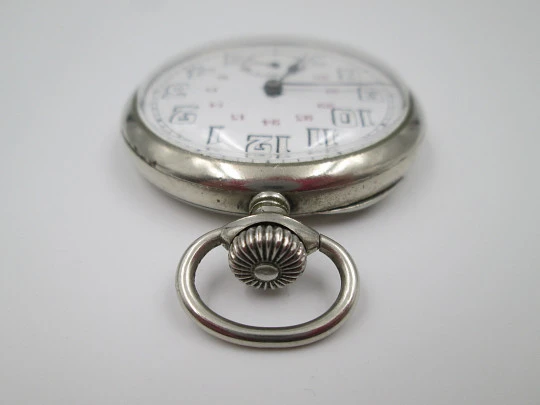 Silver plated open-faced pocket watch. Stem-wind. Porcelain dial. 24 hours scale. 1930's