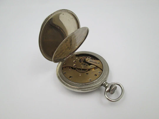 Silver plated open-faced pocket watch. Stem-wind. Porcelain dial. 24 hours scale. 1930's