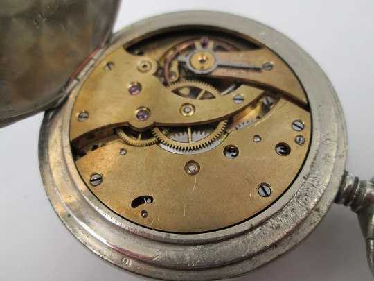 Silver plated open-faced pocket watch. Stem-wind. Porcelain dial. 24 hours scale. 1930's