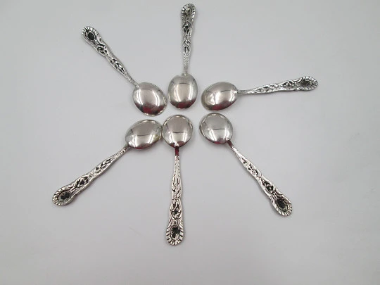 Six ornate coffee spoon set. Sterling silver. Floral and plants motifs. Europe. 1960's