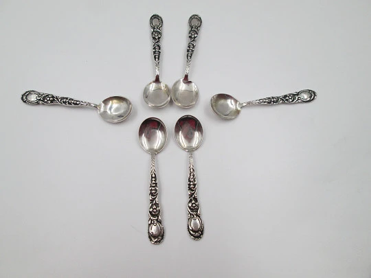 Six ornate coffee spoon set. Sterling silver. Floral and plants motifs. Europe. 1960's