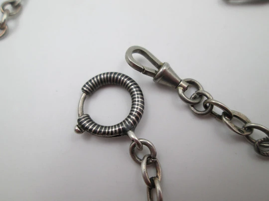 Sterling silver niello pocket watch chain. Spring ring clasp and carabiner. Europe. 1910's