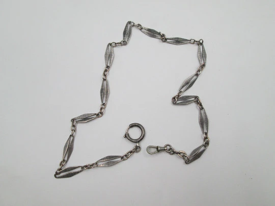 Sterling silver niello pocket watch chain. Spring ring clasp and carabiner. Europe. 1910's