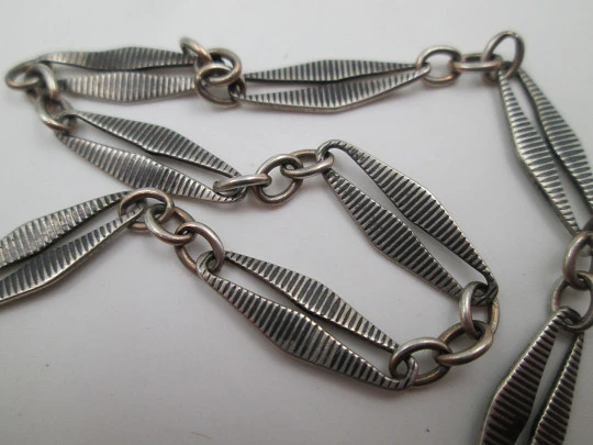 Sterling silver niello pocket watch chain. Spring ring clasp and carabiner. Europe. 1910's