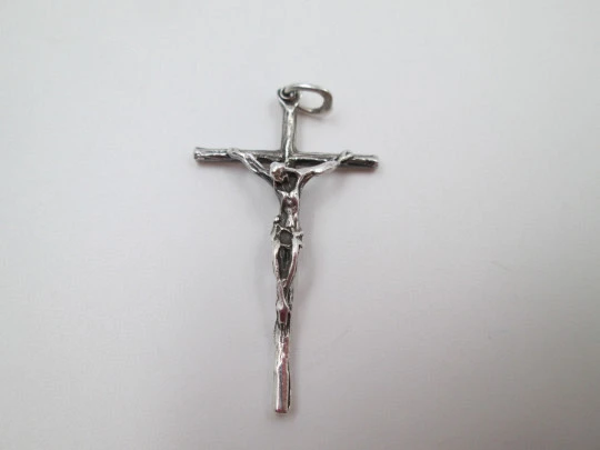 Sterling silver small cross crucifix pendant. Ring and hole on top. 1980's. Spain