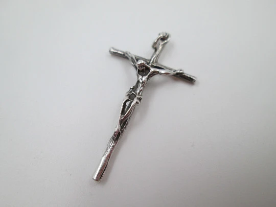 Sterling silver small cross crucifix pendant. Ring and hole on top. 1980's. Spain