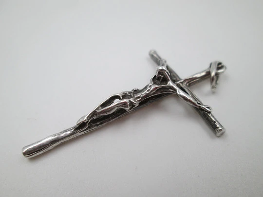 Sterling silver small cross crucifix pendant. Ring and hole on top. 1980's. Spain