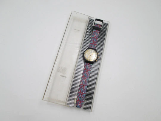 Swatch Award chronograph. Plastic & metal. Tachymetric scale. Colored strap. Box. 1991