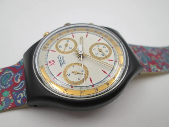 Swatch Award chronograph. Plastic & metal. Tachymetric scale. Colored strap. Box. 1991