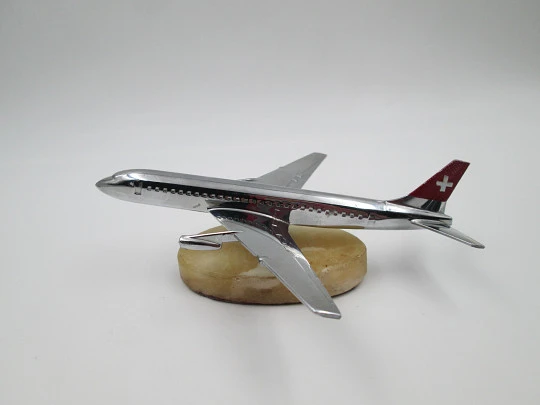 Swiss airline passenger plane. Chromed metal. Swivel support. Marble base. 1960's