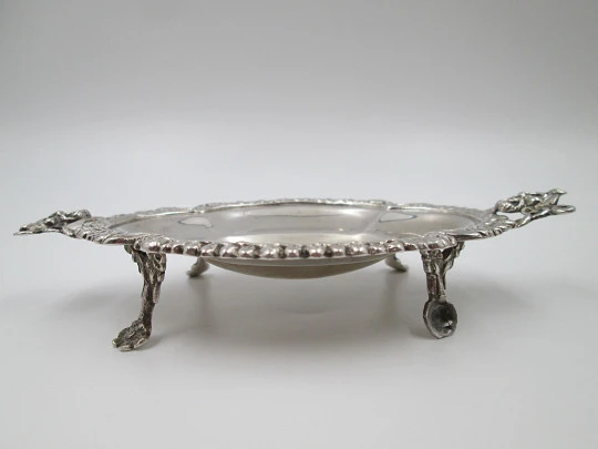 Table almond dish. Sterling silver. Fauns and vegetable motifs. Four legs. Spain. 1970's