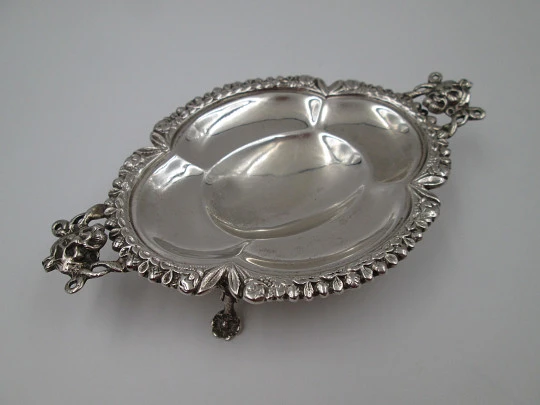 Table almond dish. Sterling silver. Fauns and vegetable motifs. Four legs. Spain. 1970's