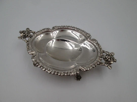 Table almond dish. Sterling silver. Fauns and vegetable motifs. Four legs. Spain. 1970's