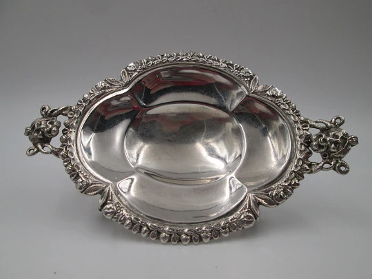 Table almond dish. Sterling silver. Fauns and vegetable motifs. Four legs. Spain. 1970's